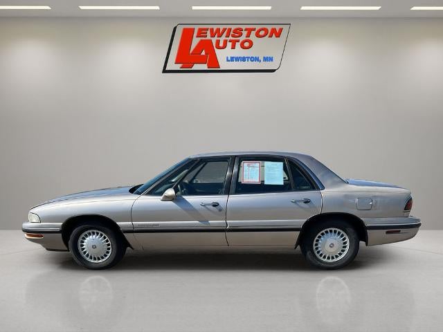 1997 Buick LeSabre Custom in Sandstone Beige (Met) — front three-quarter view