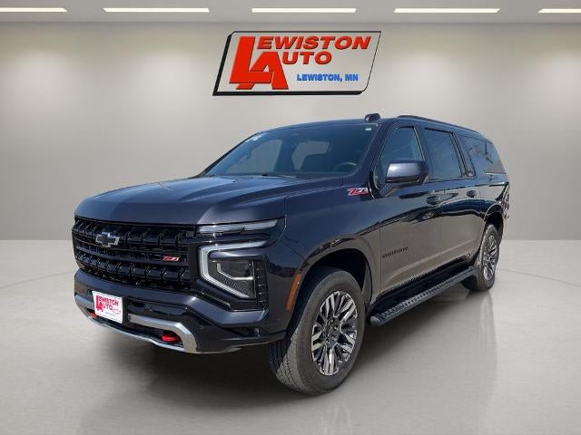2025 Chevrolet Suburban Z71 in Dark Ash Metallic — front three-quarter view